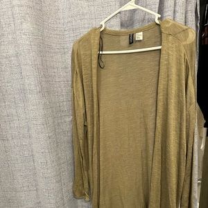 Lone green cardigan, it’s airy, not for winter but for like a cool day